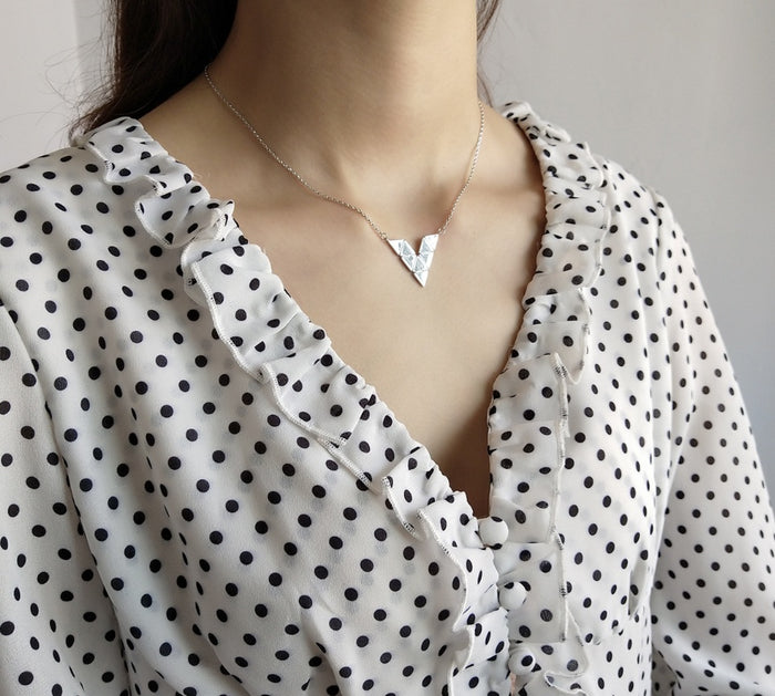 Triangle geometric necklace